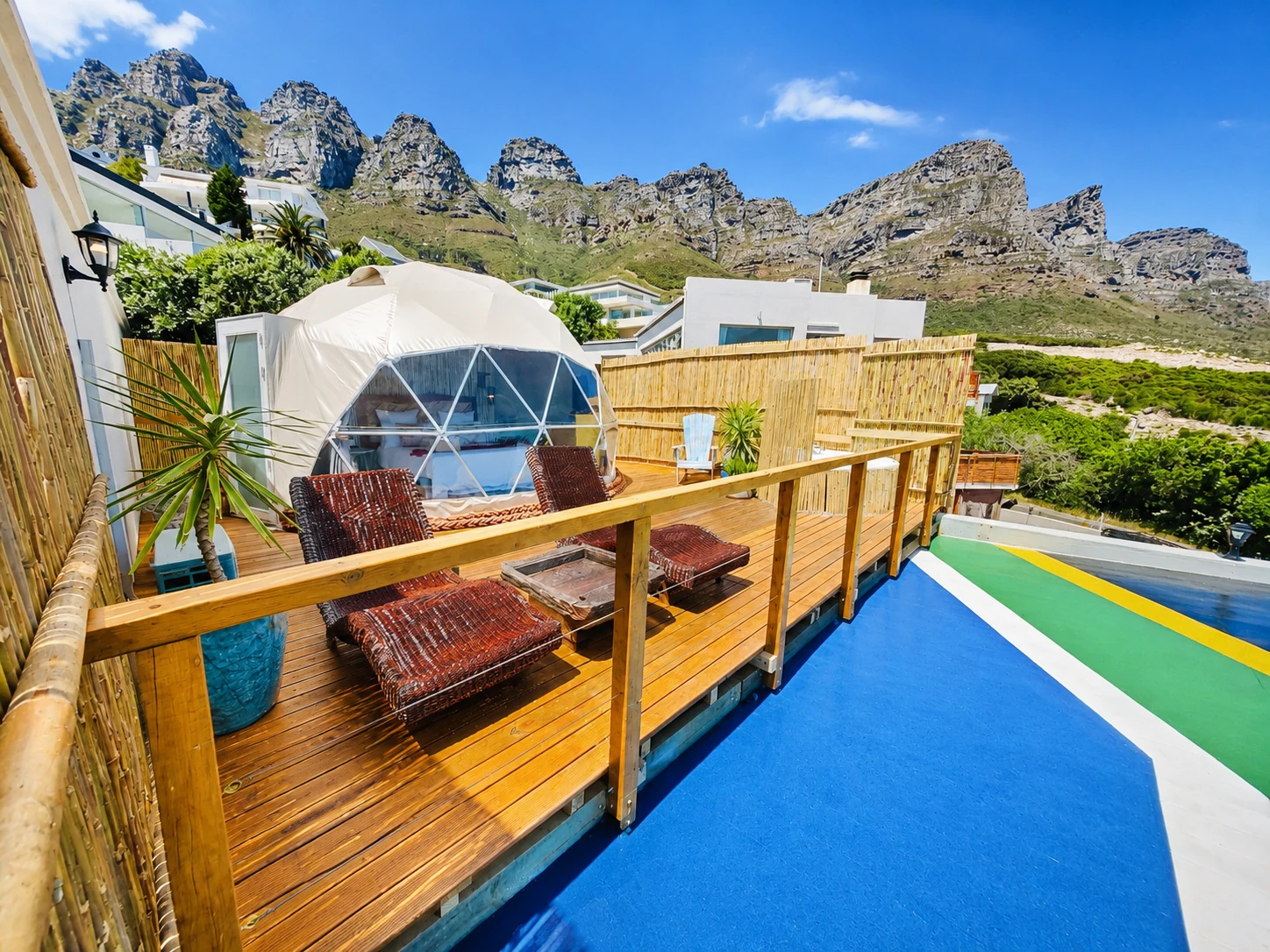 Glamping dome on a deck with mountain views